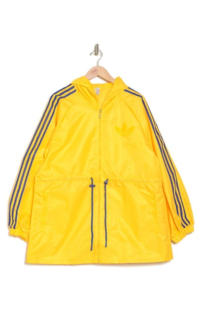 Shop Adidas Originals Monogram Windbreaker Jacket In Bold Gold