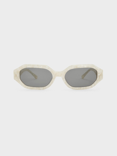 Shop Charles & Keith Gabine Recycled Acetate Oval Sunglasses In Pearl