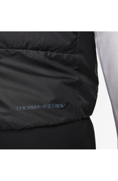 Shop Nike Therma-fit Adv Repel Aeroloft Water Repellent Down Running Vest In Black