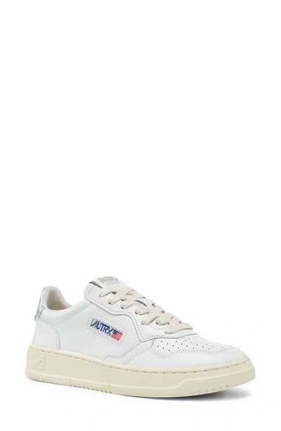 Shop Autry Medalist Low Sneaker In White/ Silver