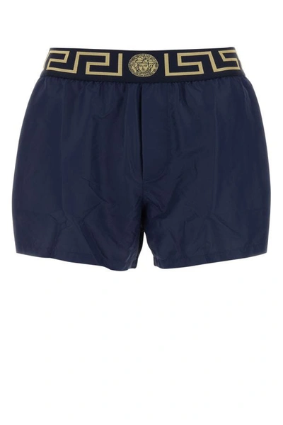 Shop Versace Man Blue Polyester Swimming Shorts