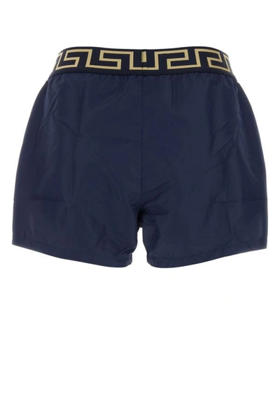 Shop Versace Man Blue Polyester Swimming Shorts