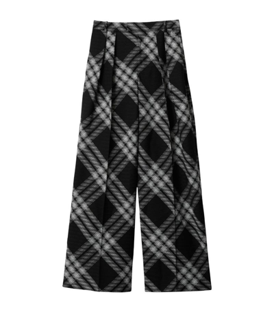 Shop Burberry Wool Check Pleated Trousers In Black