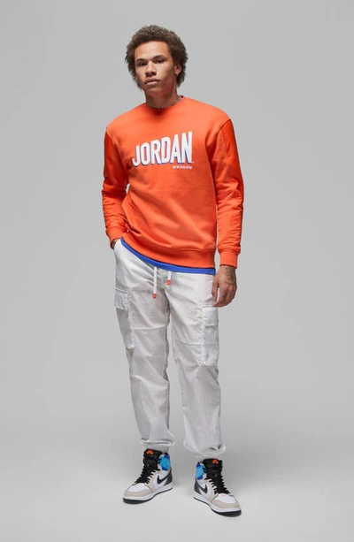 Shop Jordan Flight Fleece Crewneck Sweatshirt In Rush Orange/ White