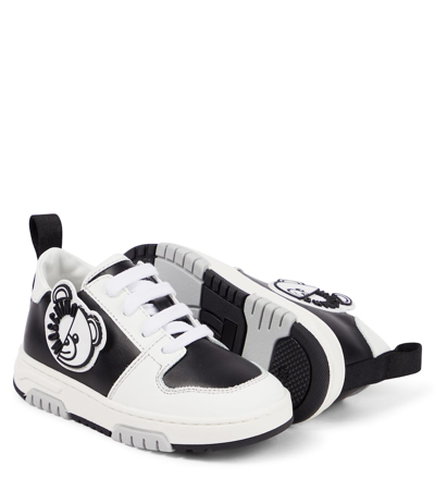 Shop Moschino Leather Sneakers In Black