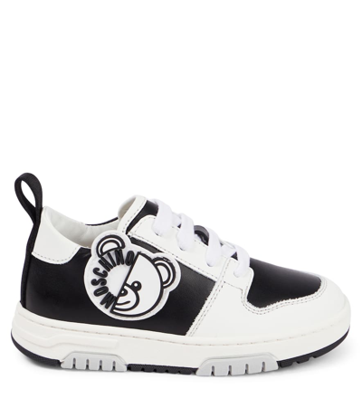 Shop Moschino Leather Sneakers In Black