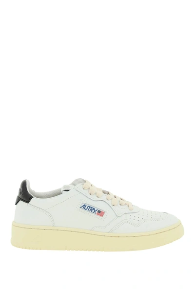 Shop Autry Leather Medalist Low Sneakers In White, Black