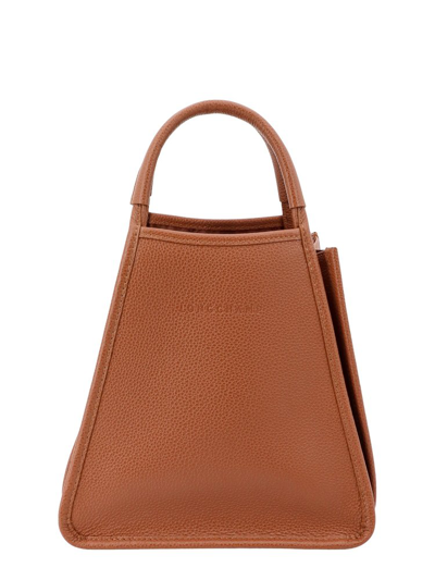 Shop Longchamp Le Foulonné Logo Engraved Tote Bag In Brown