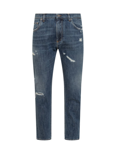 Shop Dolce & Gabbana Logo Plaque Distressed Jeans In Blue