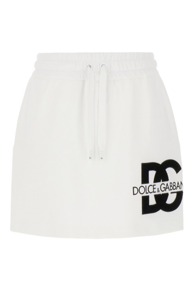 Shop Dolce & Gabbana Dg Logo Patch Jersey Mini Skirt In White