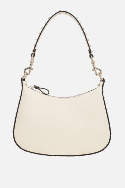 Shop Valentino Garavani Rockstud Zipped Small Shoulder Bag In White