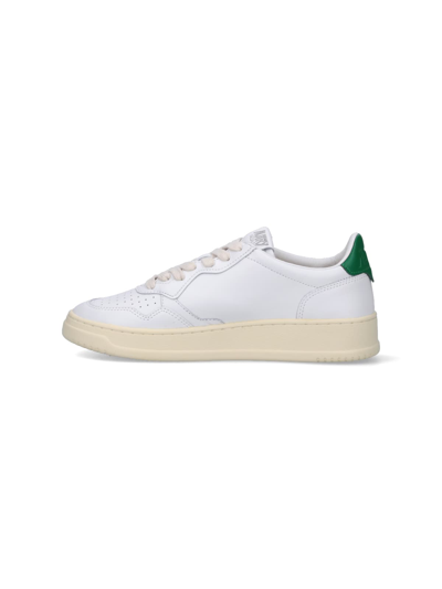 Shop Autry Medalist Low Sneakers In White/green