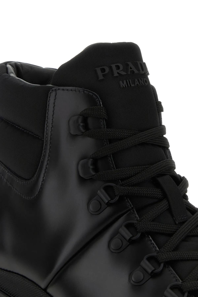 Shop Prada Black Re-nylon And Leather Brixxen Ankle Boots In Nero