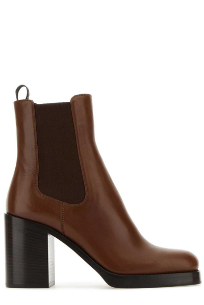 Shop Prada Rounded-toe Ankle Boots In Cognac