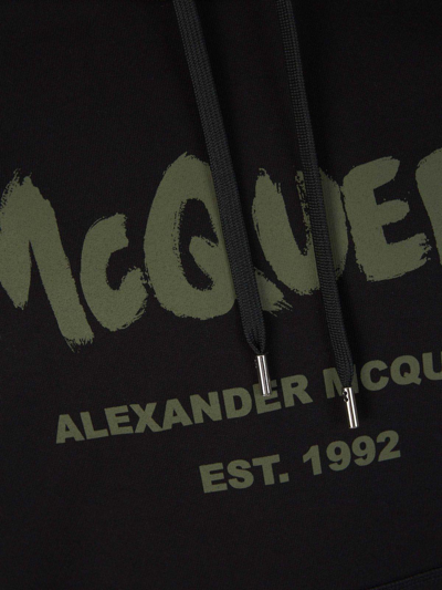 Shop Alexander Mcqueen Logo Printed Drawstring Hoodie In Black