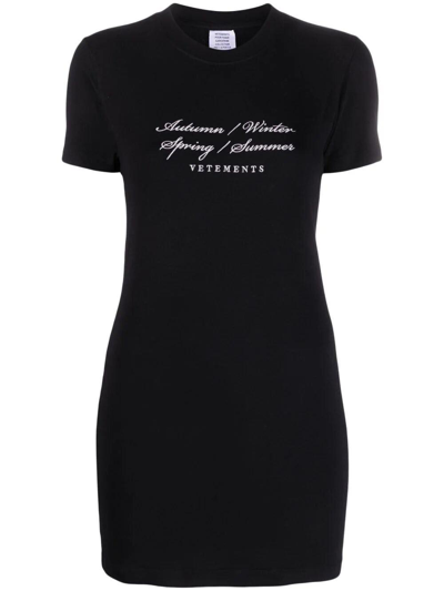 Shop Vetements Slogan Printed Mini Dress In Black