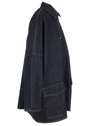 Shop Totême Long Sleeved Buttoned Denim Jacket In Raw Blue 062