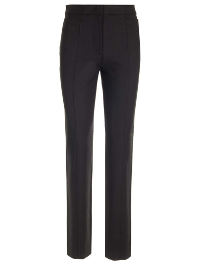 Shop Totême High-waisted Slim-cut Trousers In Black 001
