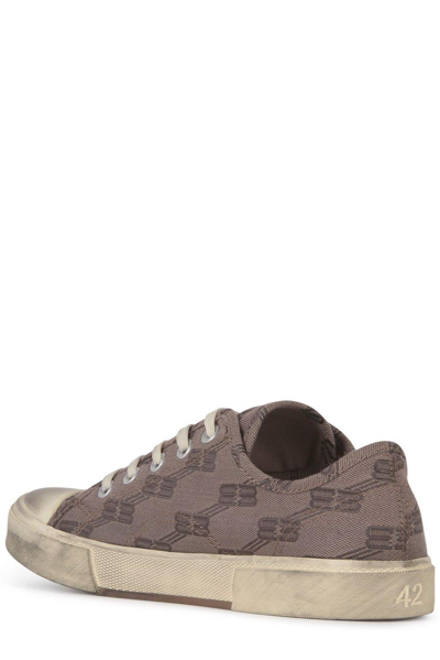 Shop Balenciaga All-over Monogram Print Laced Sneakers In Brown