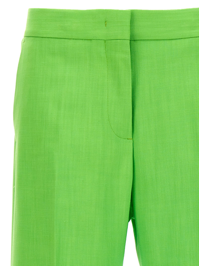 Msgm Flared Trousers With Pockets And Pleats In Green