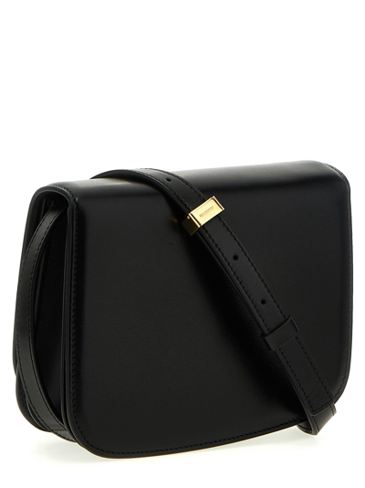 Shop Ferragamo Fiamma Small Shoulder Bag In Black