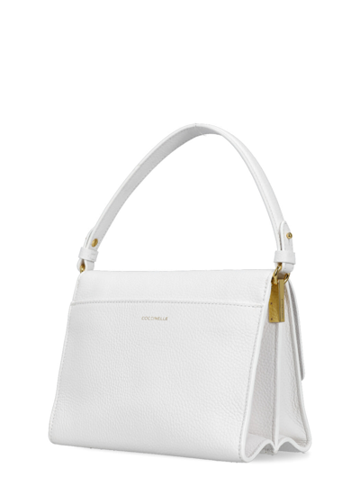 Shop Coccinelle Binxie Medium Shoulder Bag In White