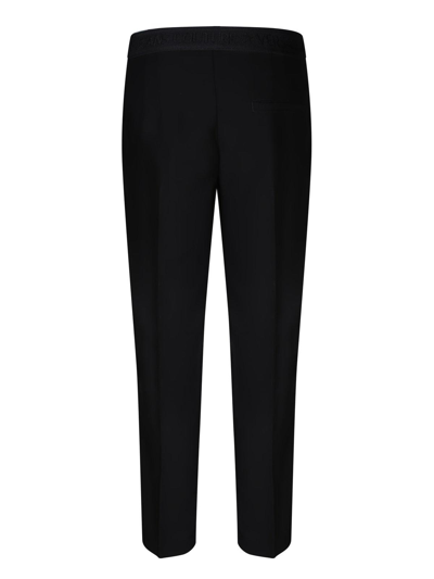Shop Versace Jeans Couture Logo Waistband Mid-waisted Trousers In Black