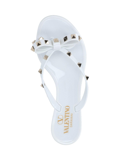 Shop Valentino Thong Sandals Rockstud In Bianco