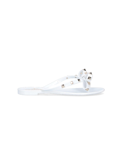 Shop Valentino Thong Sandals Rockstud In Bianco