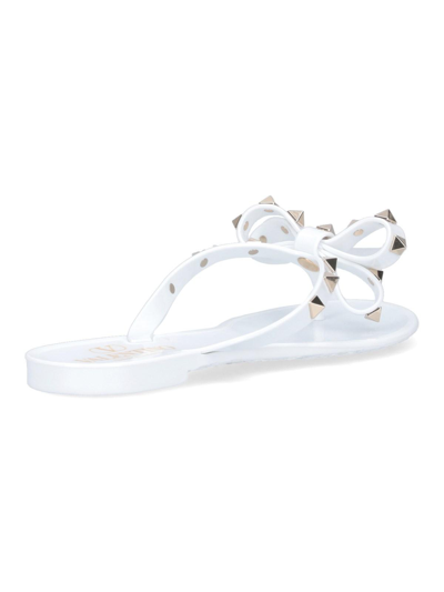 Shop Valentino Thong Sandals Rockstud In Bianco