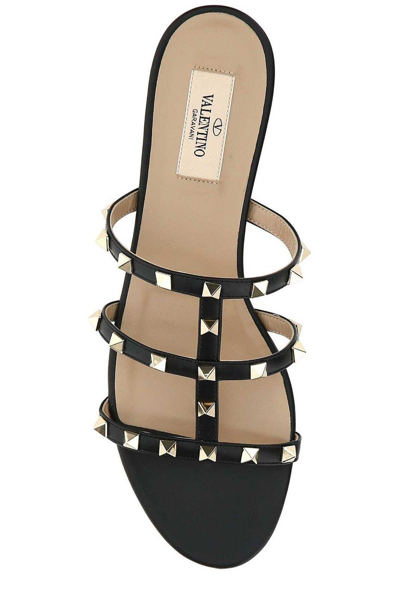 Shop Valentino Rockstud Slip-on Sandals In Nero