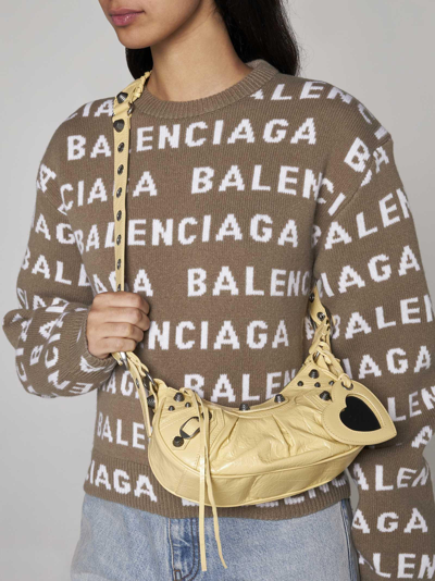 Shop Balenciaga Le Cagole Xs Leather Bag In Giallo