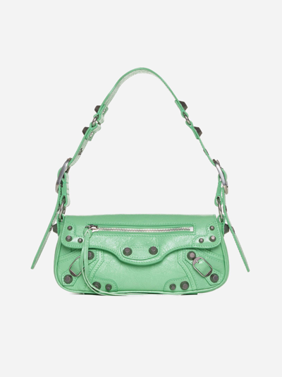 Shop Balenciaga Le Cagole Sling Leather Xs Bag In Verde