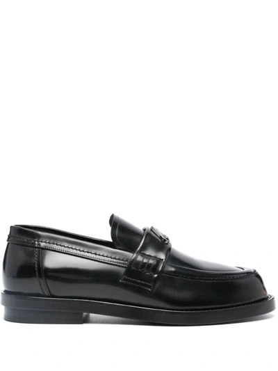 Shop Alexander Mcqueen Seal Leather Loafers In Black