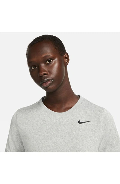 Shop Nike Dri-fit Crewneck T-shirt In Tumbled Grey/ Flt Silver