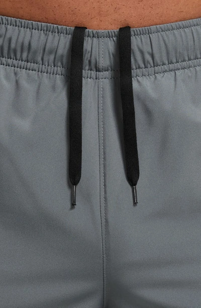 Shop Nike Form Dri-fit Versatile Pants In Smoke Grey/ Black/ Silver