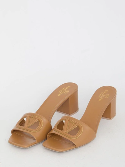 Shop Valentino Slide Vlogo Signature Sandals In Brown