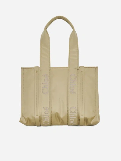 Shop Chloé Woody Medium Leather Nylon Bag In Hot Sand