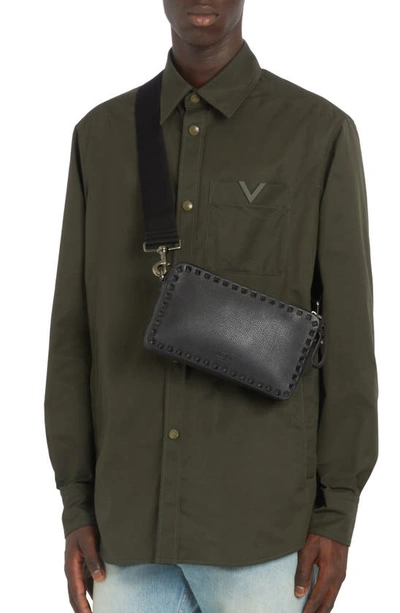 Shop Valentino Rockstud Grainy Leather Crossbody Bag In Nero