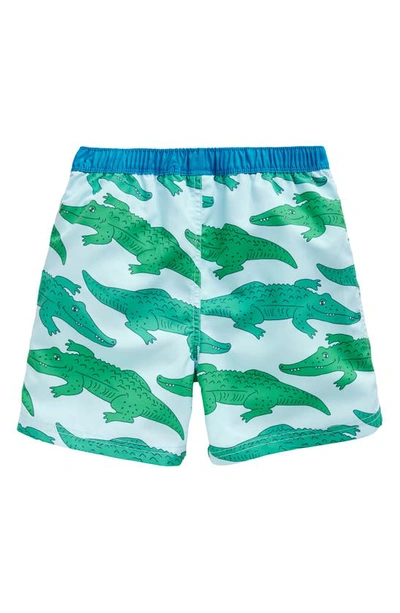 Shop Mini Boden Kids' Print Swim Trunks In Bright Green Crocs