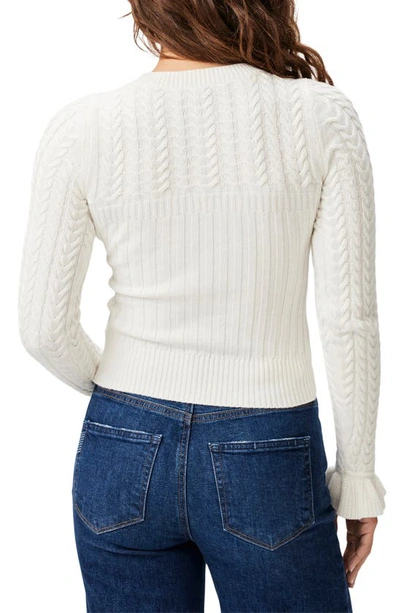 Shop Paige Henrietta Ruffle Cuff Cable Stitch Sweater In Ivory