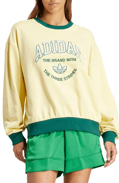 Shop Adidas Originals Contrast Trim Logo Cotton Sweatshirt In Almost Yellow