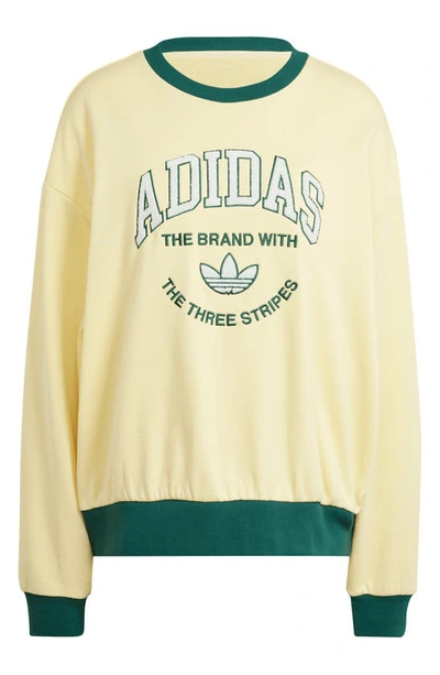 Shop Adidas Originals Contrast Trim Logo Cotton Sweatshirt In Almost Yellow
