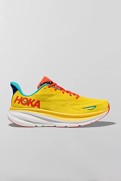 Shop Hoka One One Clifton 9 Running Sneaker In Sun Yellow, Men's At Urban Outfitters