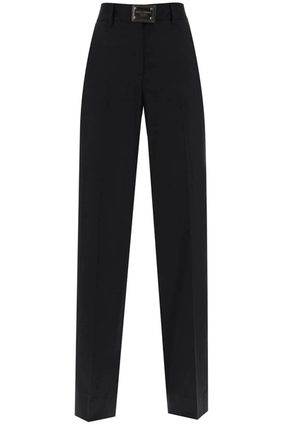 Shop Dolce & Gabbana Flannel Trousers With Logo Tag