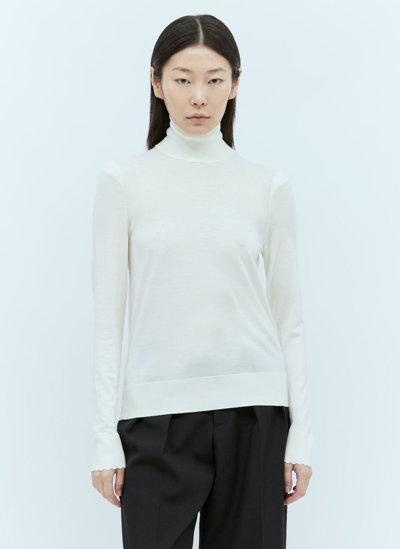 Shop Chloé Turtleneck Wool Knit Sweater In White