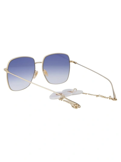 Shop Gucci Sunglasses In 004 Gold Gold Violet