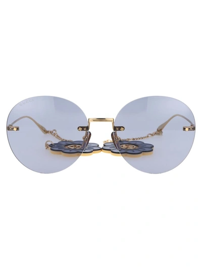 Shop Gucci Sunglasses In 006 Gold Gold Violet