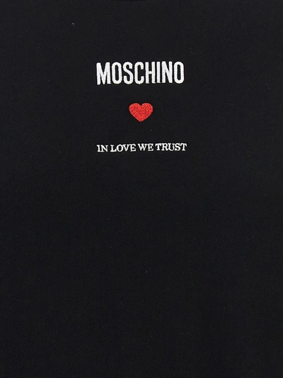 Shop Moschino 'in Love We Trust' Sweatshirt In Black