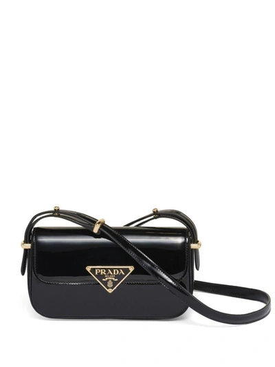 Shop Prada Logo-plaque Leather Shoulder Bag In Nero/r